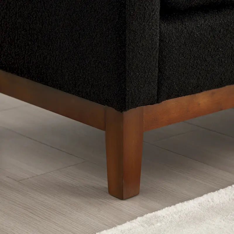 Gepolsterte Sitzbank mit Holzbeinen und Nackenrollen